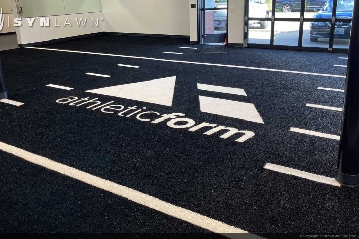 SYNLawn Reno prefab turf logos for athletic weight room applications